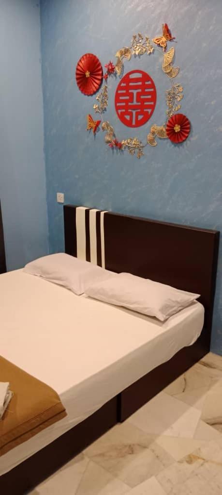 Weng Kong Homestay สลิมริเวอร์ ห้อง รูปภาพ